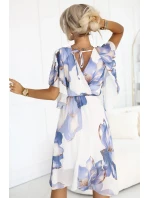 602-1 Romantické šaty s obálkovým výstrihom a volánovými rukávmi - modré kvety na bielom pozadí 602-1 Romantické šaty s obálkovým výstrihom a volánovými rukávmi - modré kvety na bielom pozadí