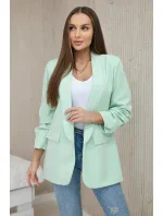 Bunda s klopou elegantná svetlá mentolová Bunda s klopou elegantná svetlá mentolová