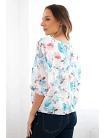 Dámska blúzka s kvetinovým vzorom a viazaním v spodnej časti mätovej farby Dámska blúzka s kvetinovým vzorom a viazaním v spodnej časti mätovej farby