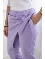 Nohavice s asymetrickou prednou časťou svetlo fialové