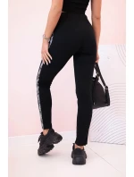 Dámske tepláky s opaskom a šnúrkou na stiahnutie čierne Dámske tepláky s opaskom a šnúrkou na stiahnutie čierne