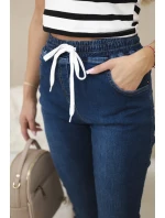 Tmavé džínsové nohavice s rebrovaným lemom