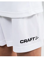 Craft Teamwear Squad Go Short Solid Jr Detské športové šortky 82.5586 pop Craft Teamwear Squad Go Short Solid Jr Detské športové šortky 82.5586 pop