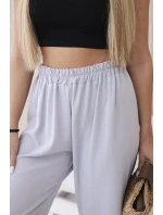 Nohavice so širokými nohavicami šedé