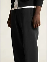Craft Corporate Frequent Sweatpants M Pánske tepláky z hrubého materiálu 81.6302 čierne Craft Corporate Frequent Sweatpants M Pánske tepláky z hrubého materiálu 81.6302 čierne