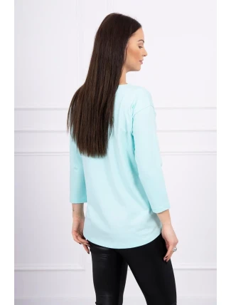 Blúzka s 3D grafikou plameniaka v mätovej farbe