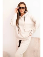Dámska súprava maslová mikina s kapucňou a nohavice s opaskom béžová Dámska súprava maslová mikina s kapucňou a nohavice s opaskom béžová
