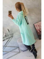 Mätová bunda s kapucňou nadmernej veľkosti Mätová bunda s kapucňou nadmernej veľkosti