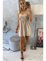 Šaty s volánmi na bokoch béžovej farby