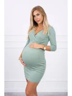 Priliehavé šaty s prestrihom pod prsiami tmavo mätovej farby Priliehavé šaty s prestrihom pod prsiami tmavo mätovej farby