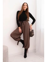 Dámske nohavice so širokými nohavicami a viazaním v spodnej časti mocca