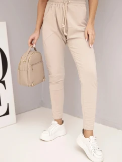 Dámske tepláky s elastickým pásom a šnúrkou na stiahnutie béžové