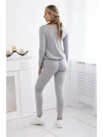 Kombinéza z viskózy v páse sivá Kombinéza z viskózy v páse sivá