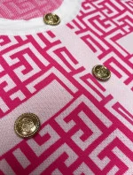 Dámska pletená blúzka vo fuchsiovej farbe s krátkymi rukávmi (009)