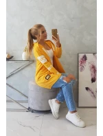 Plášť s horčičným nápisom Plášť s horčičným nápisom