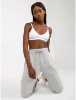 B 005 tepláky.04X šedá